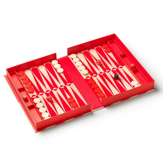 Backgammon set with red tray, cream checkers, and dice; case lid open
