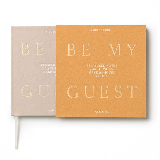 Beige and beige yellow guest book set, both titled 'BE MY GUEST'
