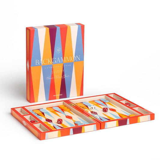 Lacquered red backgammon set with striped boards open and dice visible