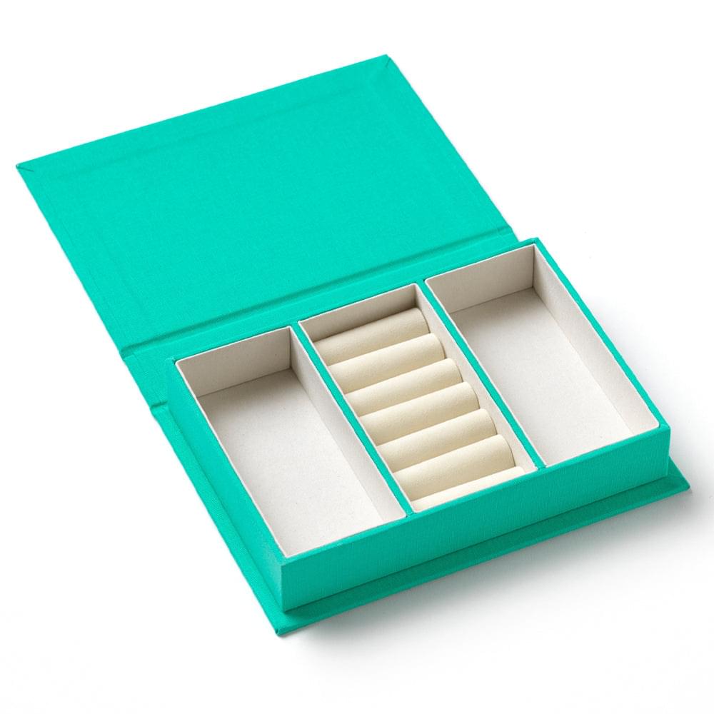 Turquoise small jewelry box open, showing three compartment sections