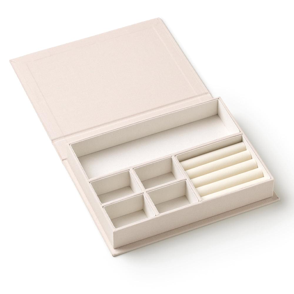 Beige medium jewelry box open with white organizer insert and multiple compartments