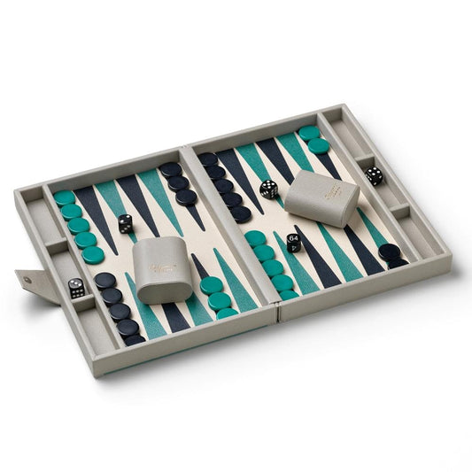 Open backgammon board with green and navy checkers and dice