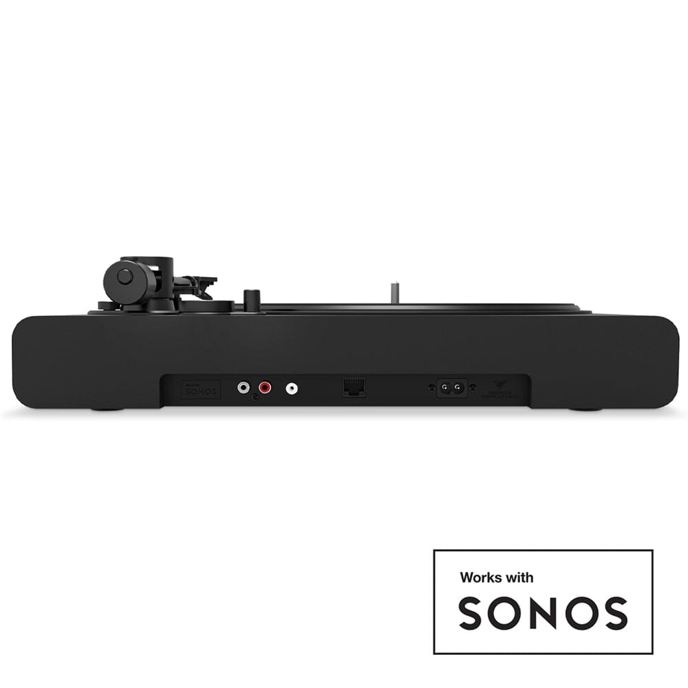 Victrola black turntable rear panel with ports and tonearm base, side view