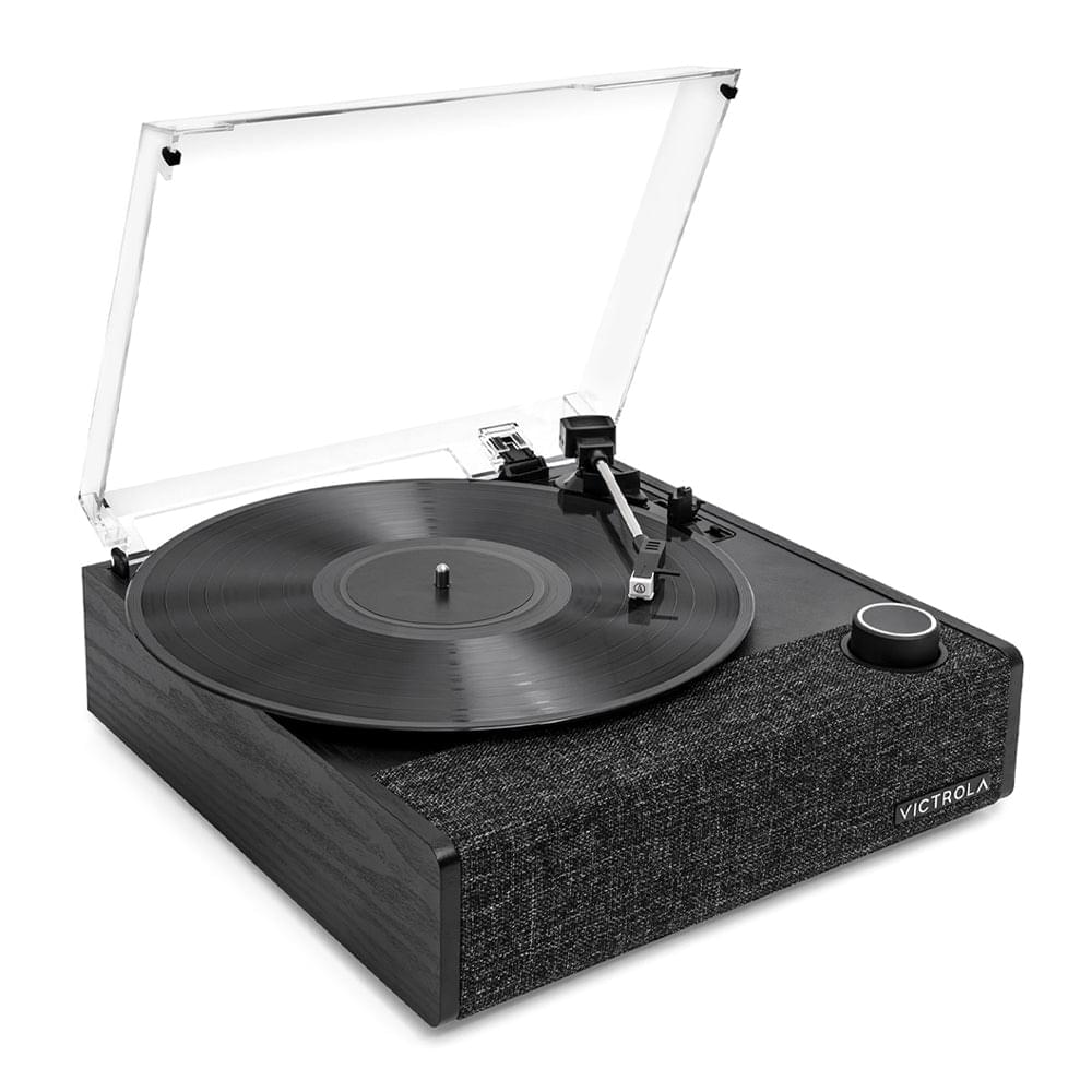 Victrola turntable with open clear lid, black vinyl record, and tonearm