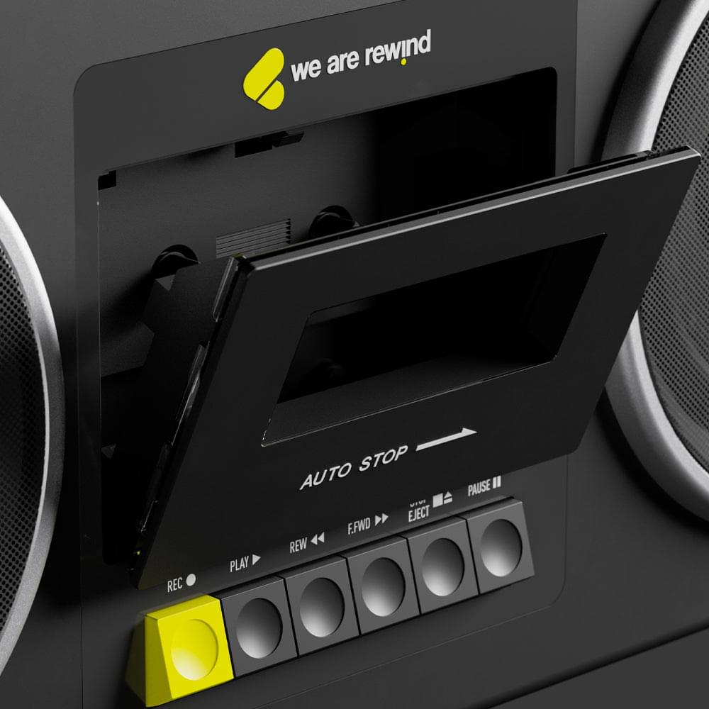 Black cassette player and recorder with cassette window and control buttons.