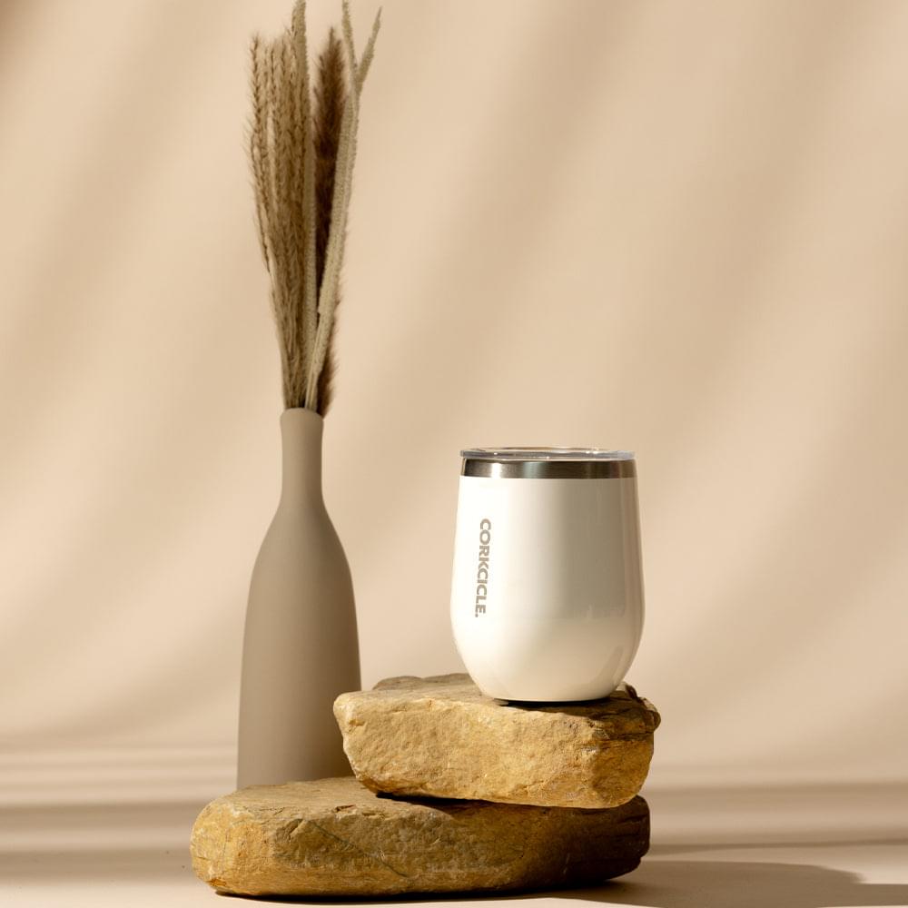 Corkcicle stemless tumbler in cream with stainless rim