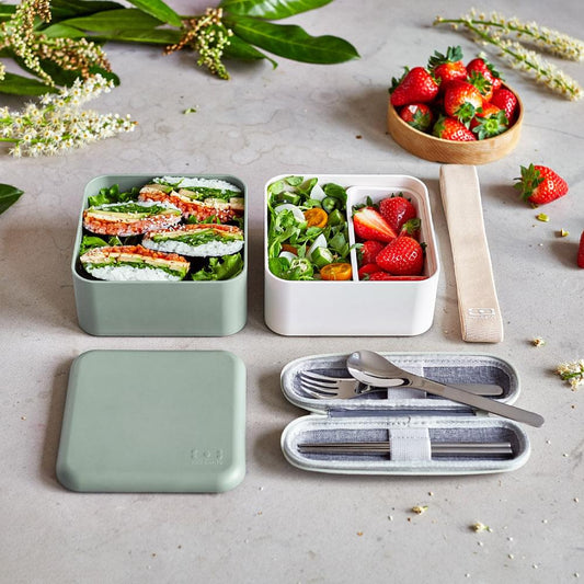 Monbento MB square bento box set with compartments, green lid, and utensils