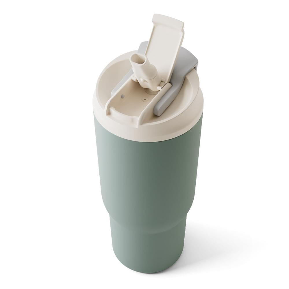 Mint green travel mug with open white lid and straw spout