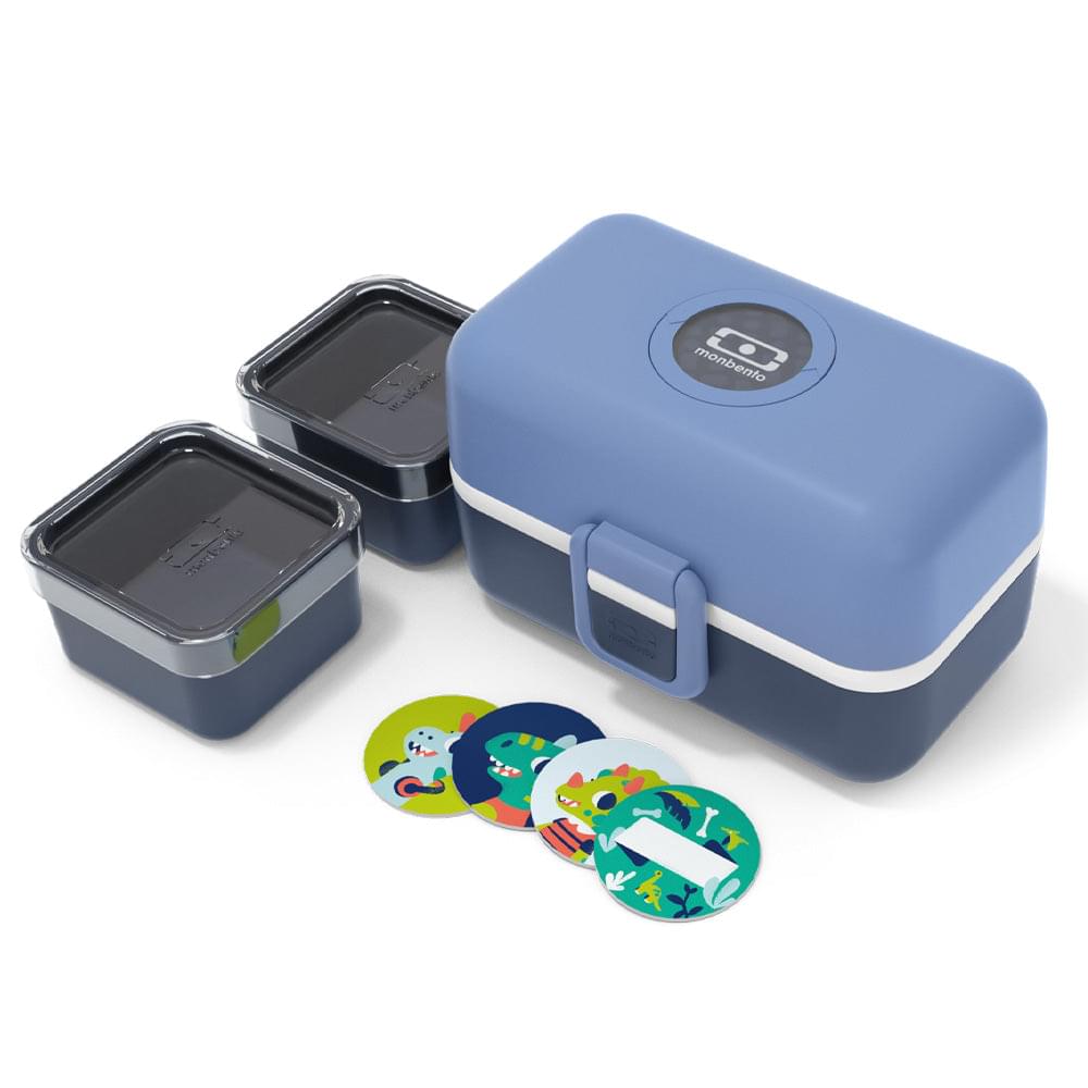 Blue kids bento box with lid open showing small sauce containers on side