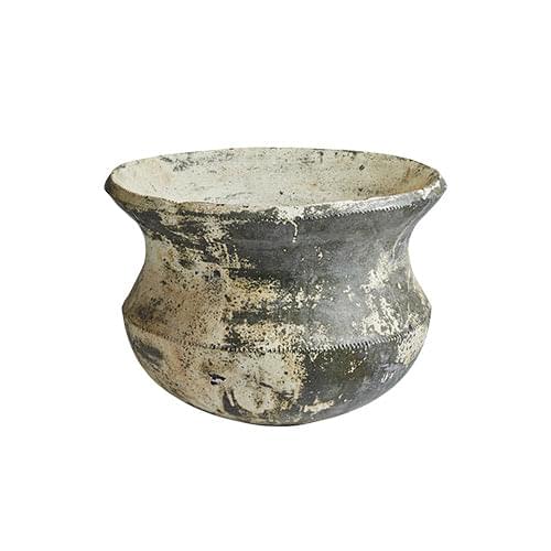 Speckled concrete planter urn with wide rim and curved belly