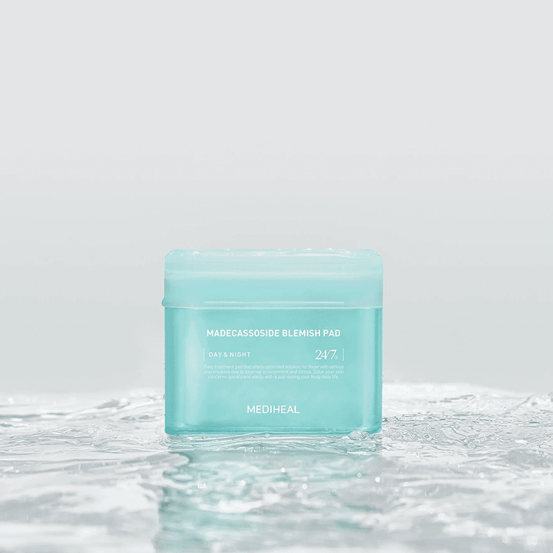 MEDIHEAL blemish pad container standing in water, light teal jar with 24/7 label