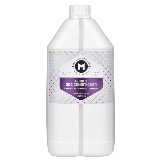 White dog conditioner bottle with pump, Purify label.