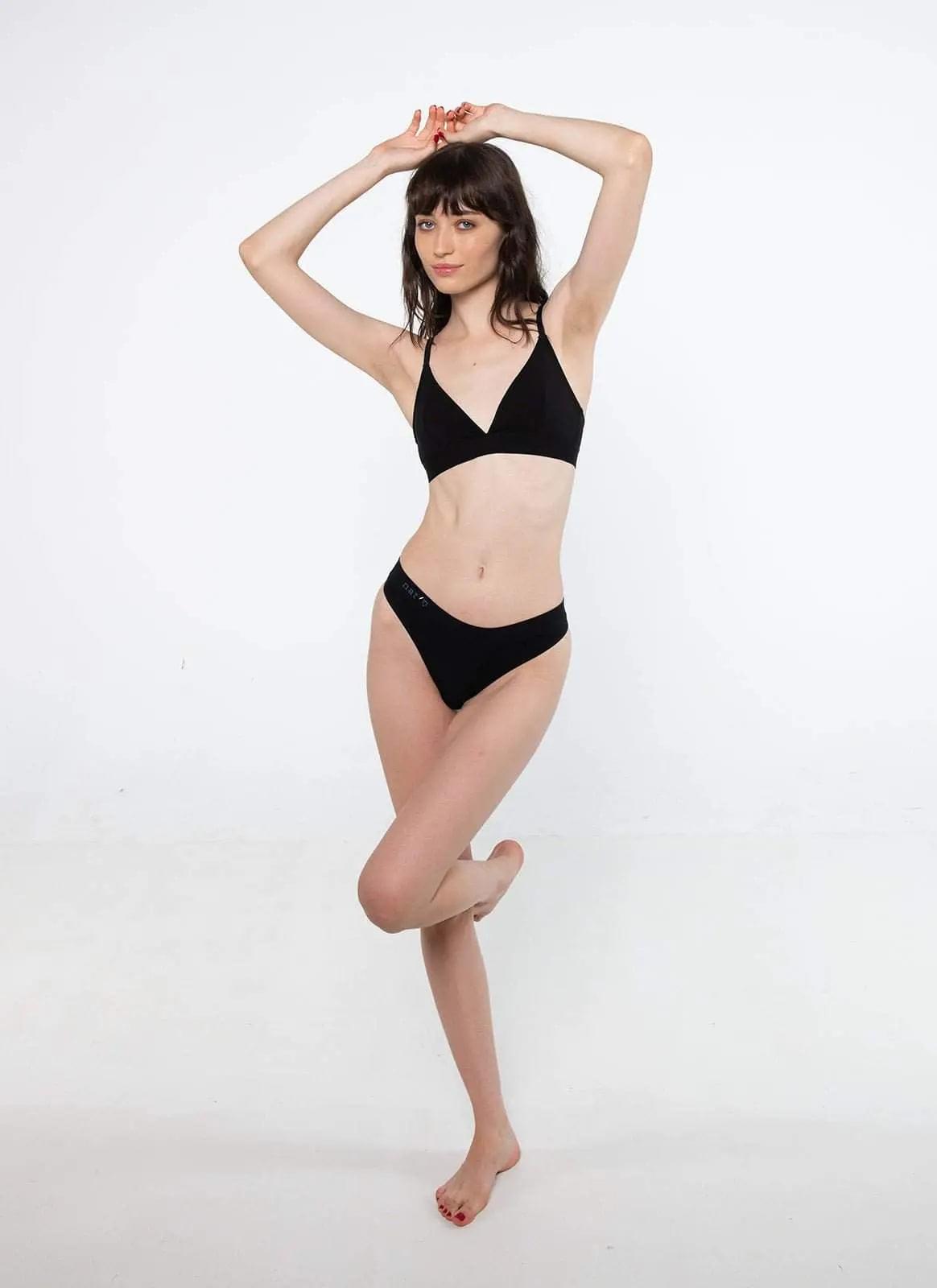 Black cheeky g-string bottom with low-rise waist and thong back