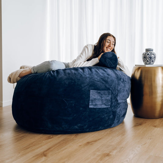 DreamPod® Classic navy bean bag lounge chair with headrest and side label patch