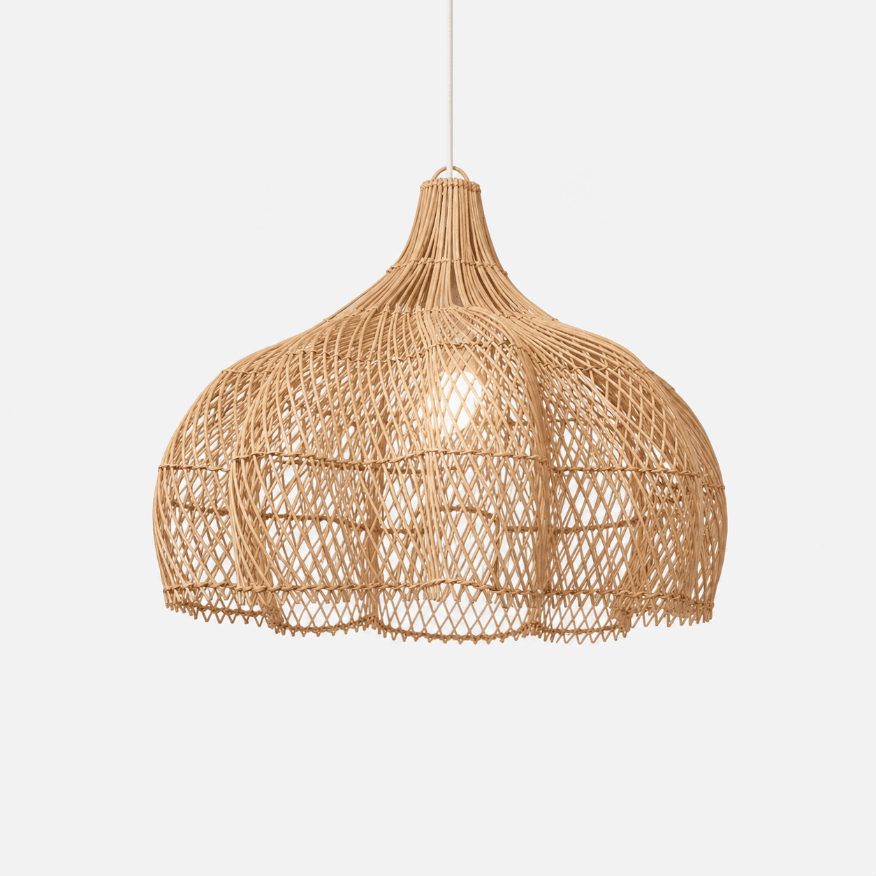 Natural rattan pendant light with inverted bell shade, woven lattice, and cord