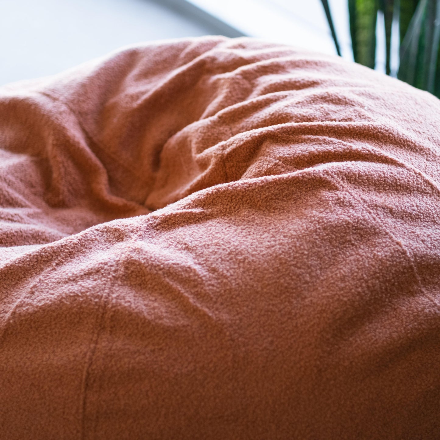 Boucle fur bean bag in rust