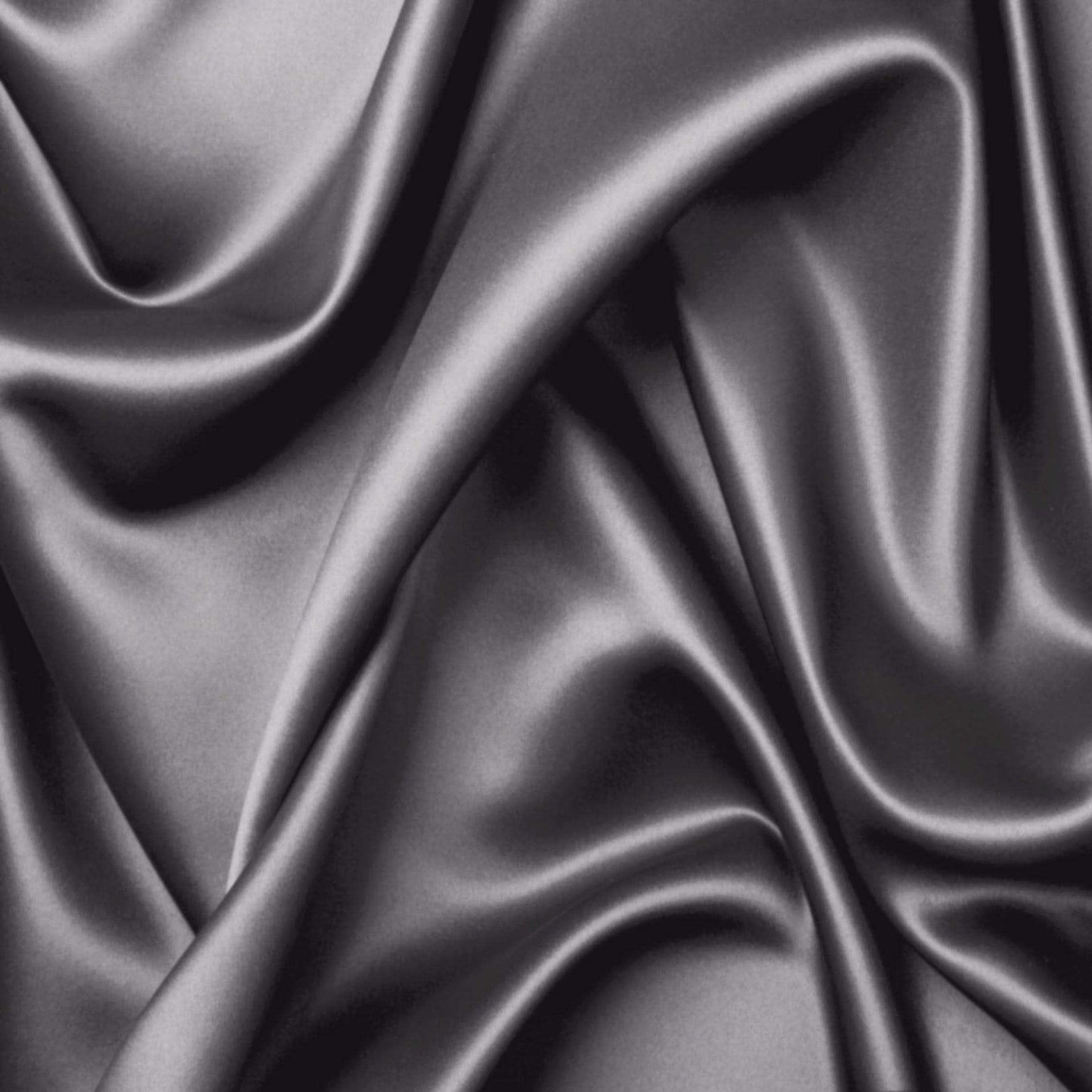 Charcoal silky bamboo fabric close-up with smooth satin-like sheen and drape