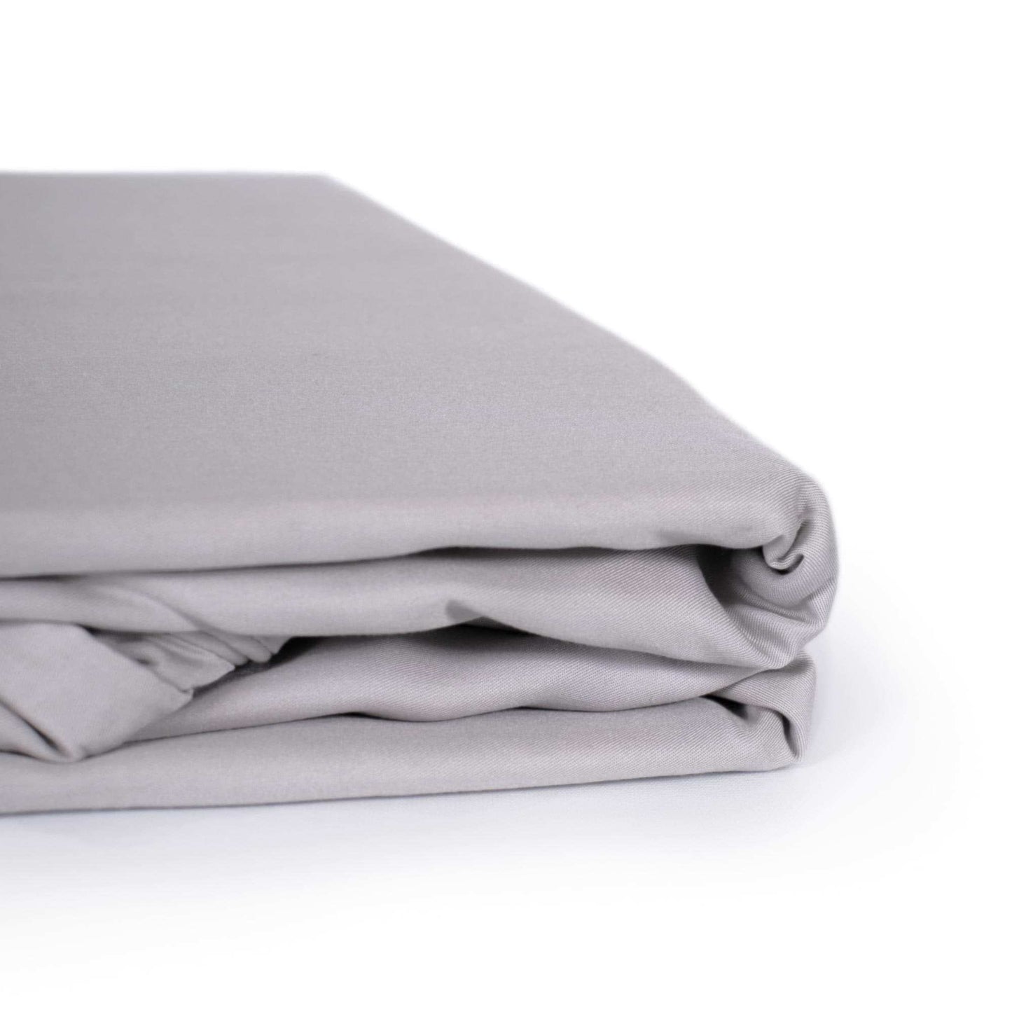 Folded light gray bamboo sheet stack with smooth, wrinkle-resistant finish