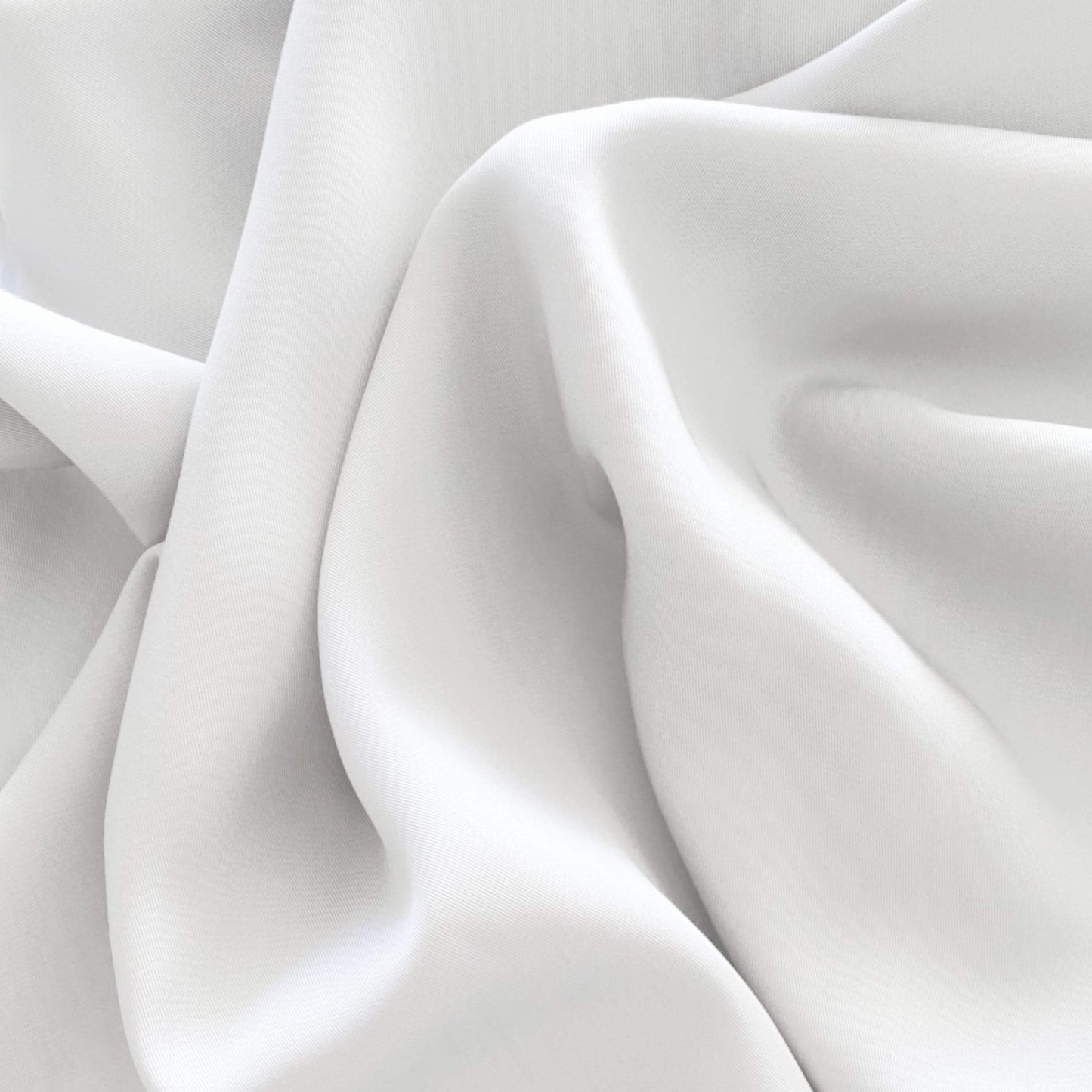 White silky bamboo pillowcase fabric close-up, smooth sheen with soft drape