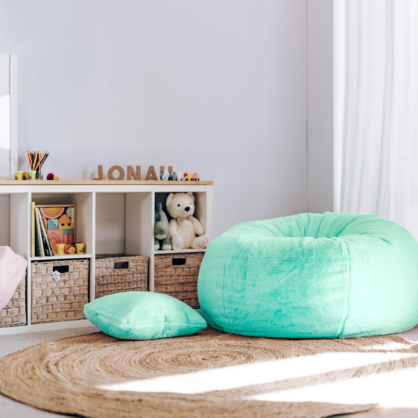 Turquoise plush fur cloud bean bag with matching small pillow