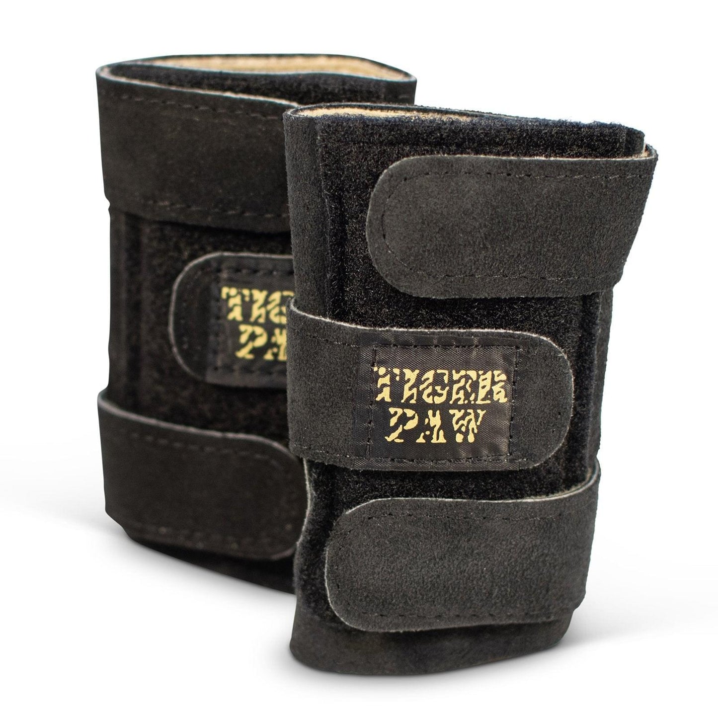 Black suede wrist supports with hook-and-loop straps and tiger paw patch