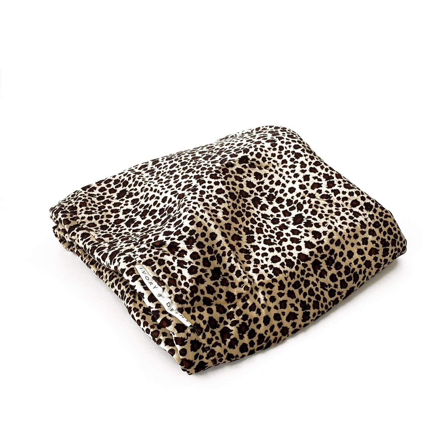Leopard print faux-fur bean bag laid flat, folded with patterned underside
