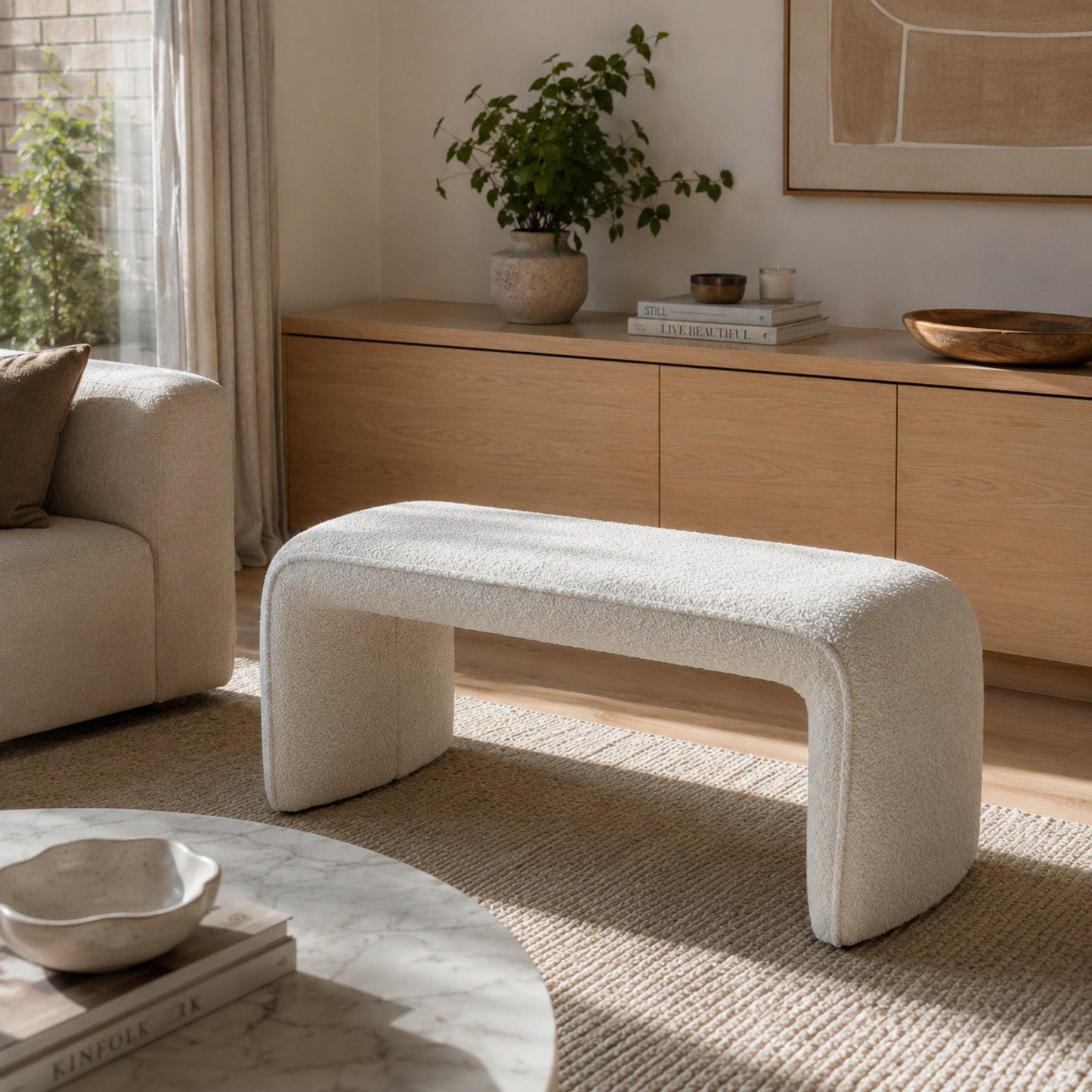 White boucle bench seat with smooth top and open frame front