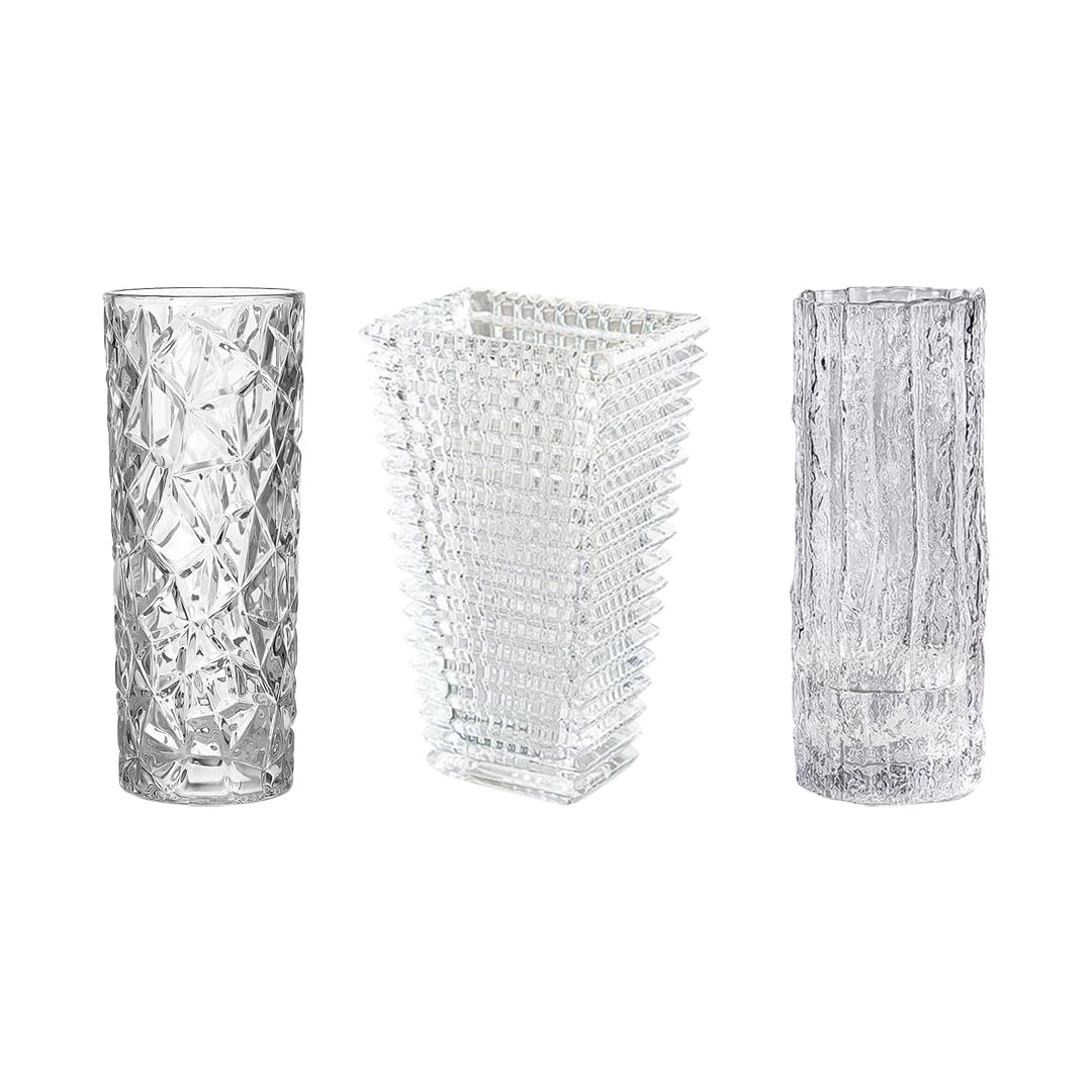 Set of three clear glass vases: faceted diamond, textured grid, and vertical rib styles
