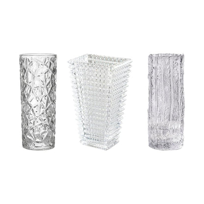 Set of three clear glass vases: faceted diamond, textured grid, and vertical rib styles