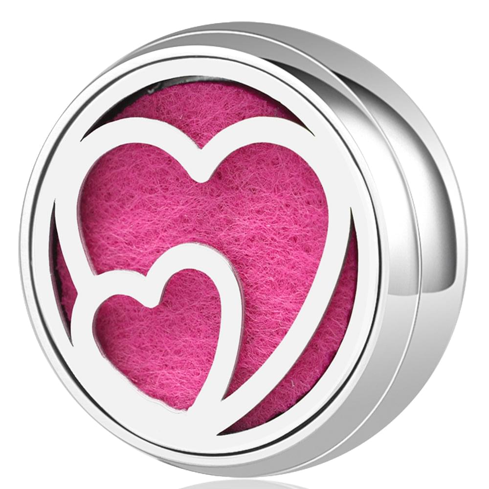 Round wearable diffuser locket with pink heart felt design in silver bezel