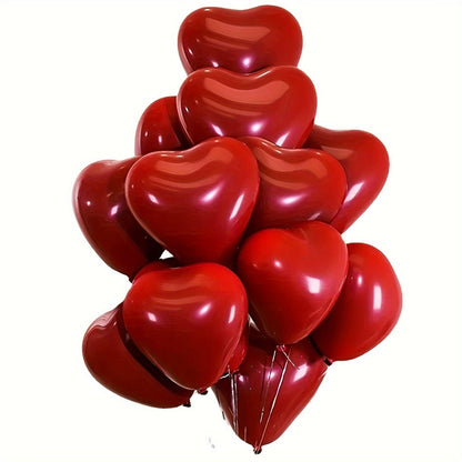 Red glossy heart balloons cluster with attached strings