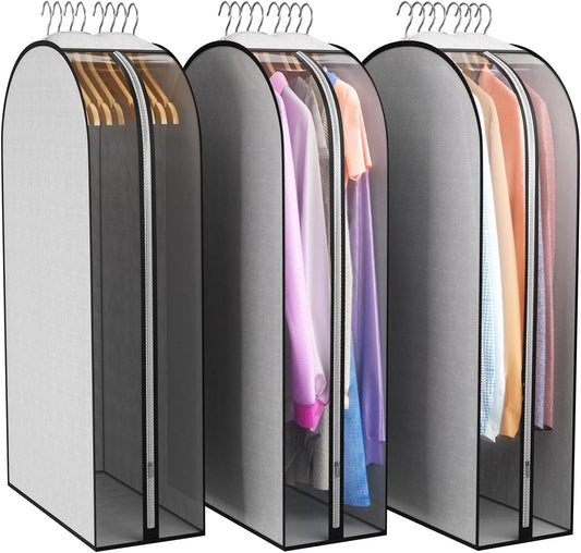 Grey hanging garment bags with clear side panels, set of three, shown on hangers