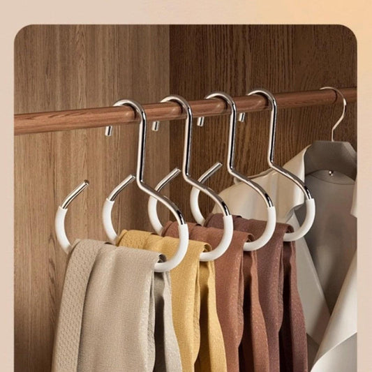 White plastic coat hook set with curved non-slip hanger grips on a rod