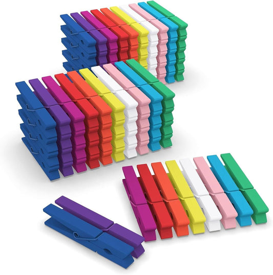 Set of colorful wooden clothespins in stacked rows, red, purple, blue, green, and more