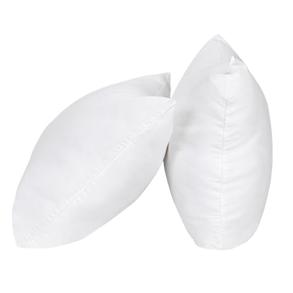 Two white long pillows with stitched cotton covers and plush poly filling
