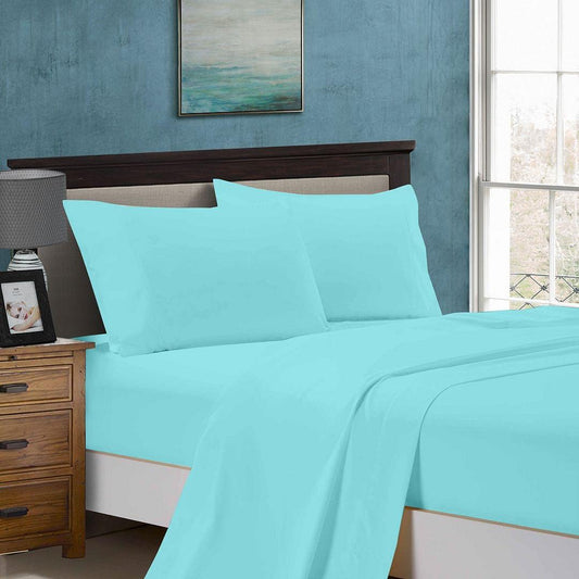 King-size aqua sheet set with pillowcases and flat sheet on bed