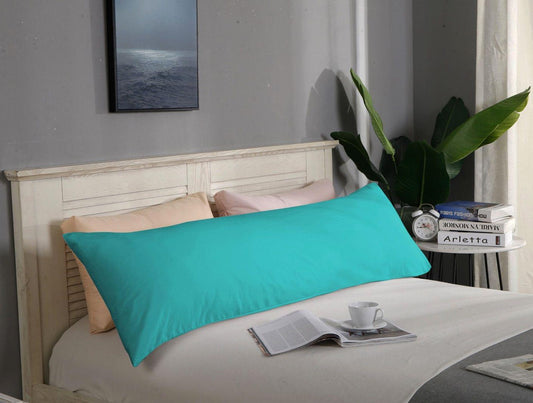 Teal body pillowcase on a bed, shown on a single pillow
