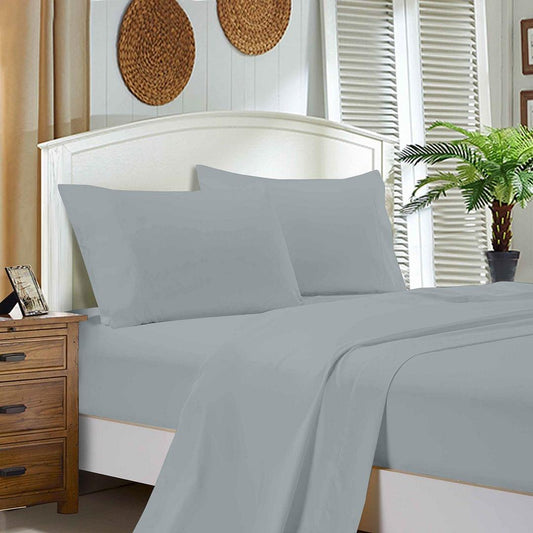 Silver bed sheet set on single bed with fitted sheet and pillowcases