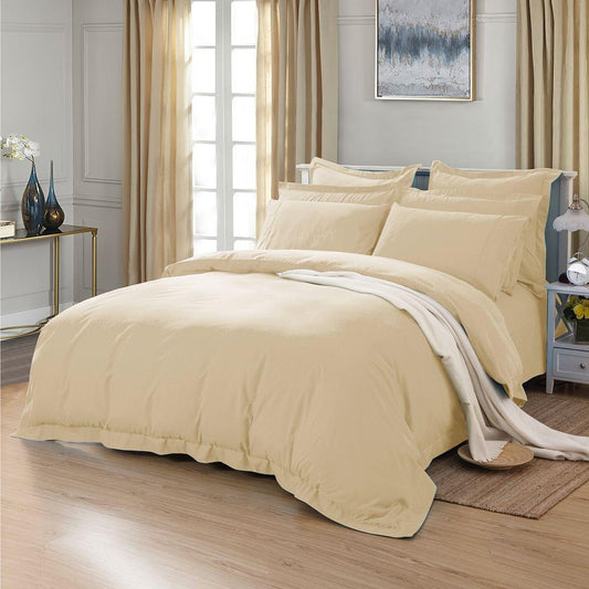 Cream tailored duvet cover set with matching pillowcases, neatly draped on bed
