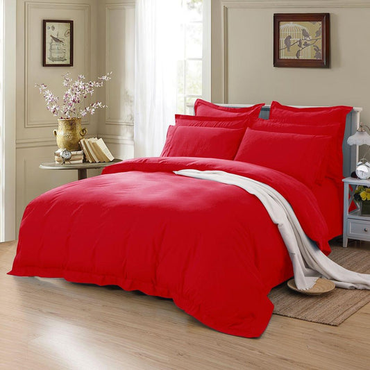 King single red duvet quilt cover set with two pillowcases on bed with draped blanket