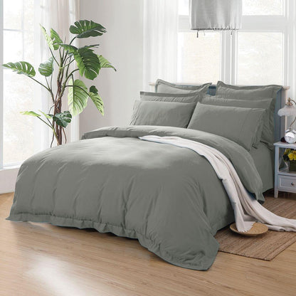 Grey queen duvet quilt cover set on bed with matching pillowcases