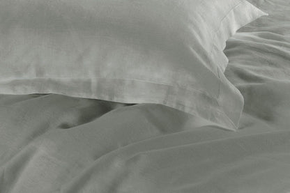 Grey duvet cover fabric close-up with smooth texture and subtle folds