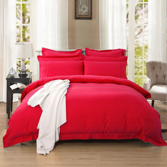 Red duvet quilt cover set with matching pillowcases, neatly tailored bedding set