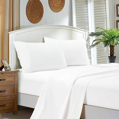 White bed sheet set with flat sheet, fitted sheet, and matching pillowcases