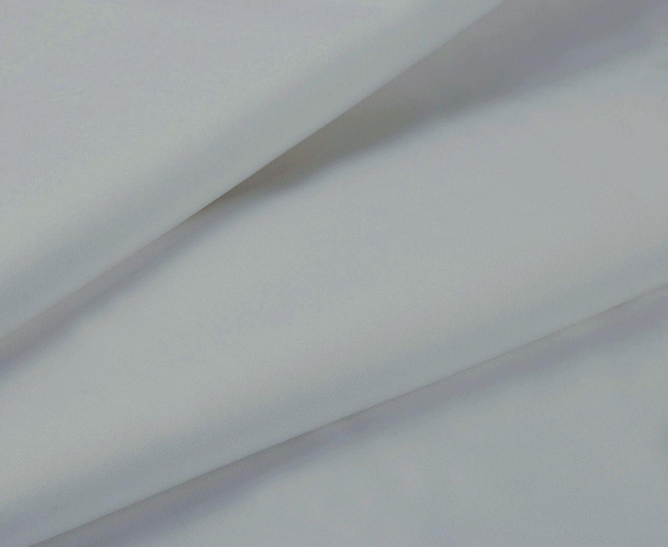 Silver sheet fabric close-up with smooth surface and soft folds