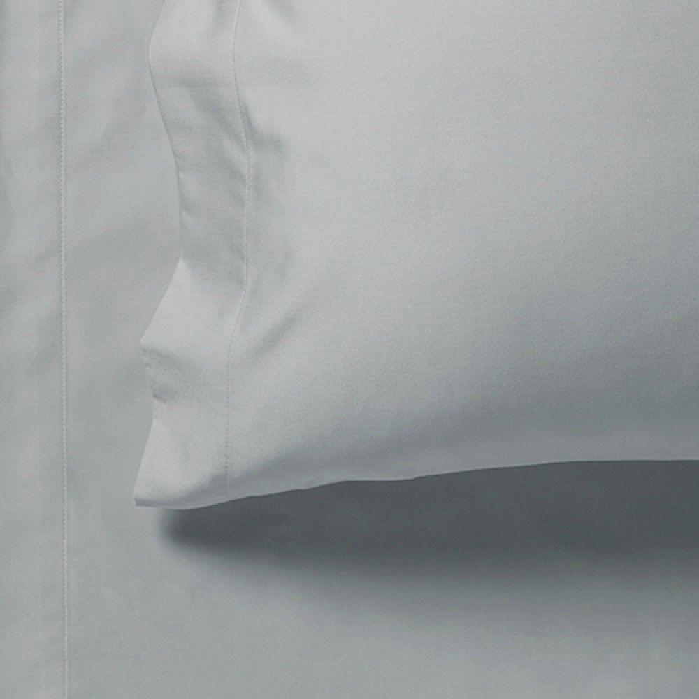 Silver sheet edge detail with stitched seam and gathered fabric