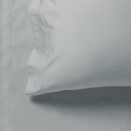 Silver sheet edge detail with stitched seam and gathered fabric