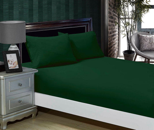 Queen fitted sheet and pillowcases set, dark green bedding on a bed