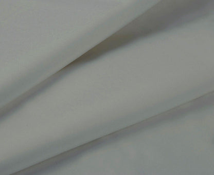 Grey sheet fabric close-up with smooth, wrinkle-free texture