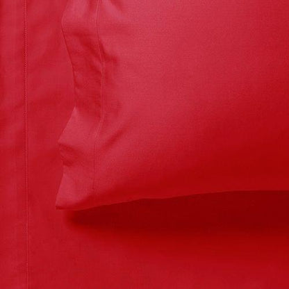 Red bed sheet seam and stitching detail with elasticized edge